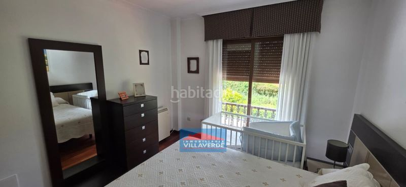 Foto 30dc8931-4118-4ceb-8553-31e3c557f315. Casa adossada amb calefacció aparcament a Darbo Cangas