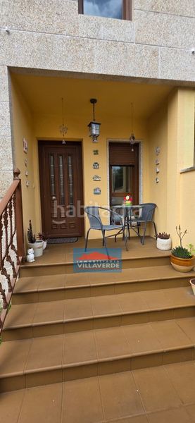 Foto e34f04ee-a074-4ee5-a489-d0cec8e3b7af. Casa adossada amb calefacció aparcament a Darbo Cangas