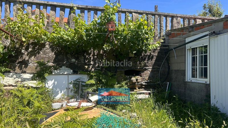 Foto 3348d4f8-9241-4388-ba22-a48d274a81fd. Casa amb aparcament a Marín