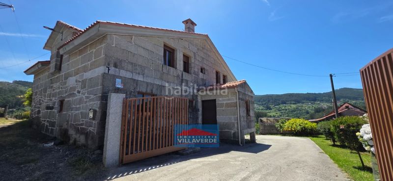 Foto a621d40f-1595-4d73-b1ef-fd30e5f70aea. Casa amb aparcament a Marín