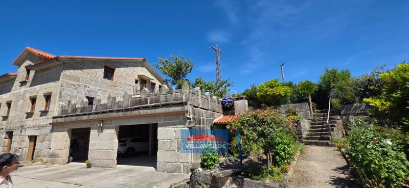 Foto fa74d54a-e3a0-40ff-996d-37d2f588157d. Casa amb aparcament a Marín