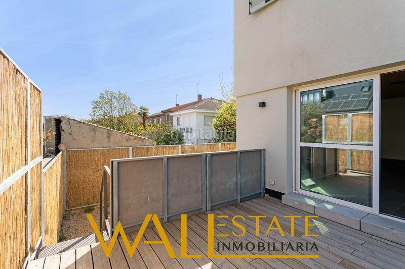 Foto a8b29fcd-cc18-4bbd-b9a7-5f3bbd85c322. Casa adossada amb calefacció aparcament a Canillejas Madrid