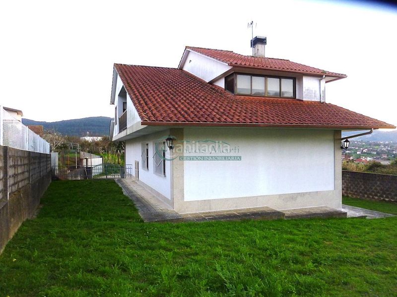 Foto 507d93da-4689-4869-85cf-b3ce30a71b0f. Casa amb calefacció aparcament a Bembrive Vigo