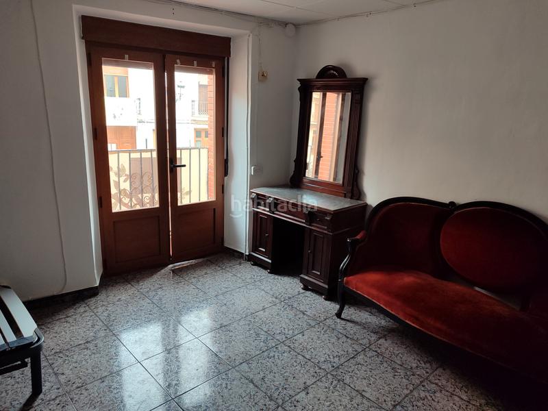 Foto 9134f463-7f76-4b54-a121-fecd985aa1ba. Casa aparellada a plaza mayor 19 a Ayora