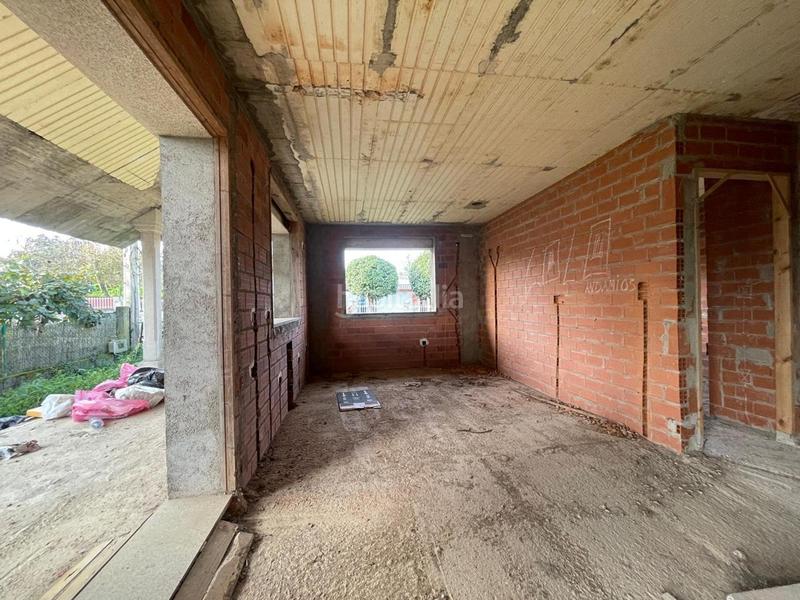 Foto 8b5ce4b1-d4a1-4af3-ae38-4588ee1dd7dd. Casa amb aparcament a Bergondo