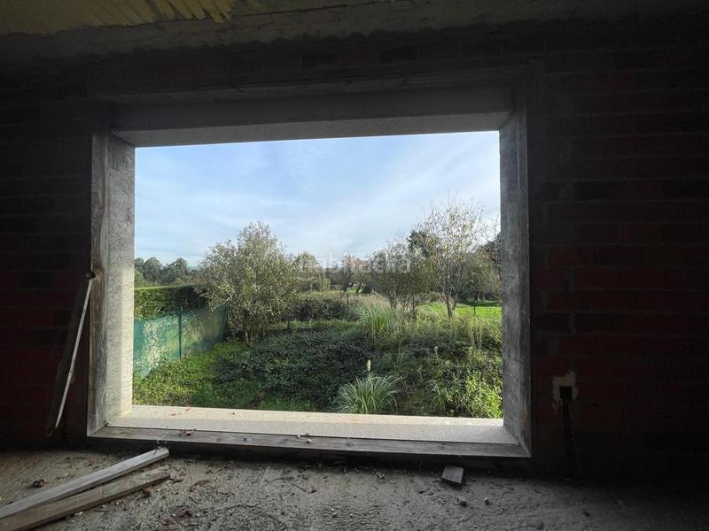 Foto c61710bf-a622-49f0-b78d-835c53e0ae34. Casa amb aparcament a Bergondo