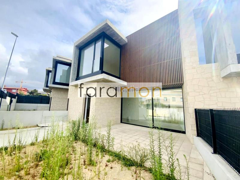 Foto 75df50d8-ab17-4b1c-bc3d-4bd98c4291ef. Casa a schiera con riscaldamento parcheggio in San Pedro da Ramallosa Nigrán