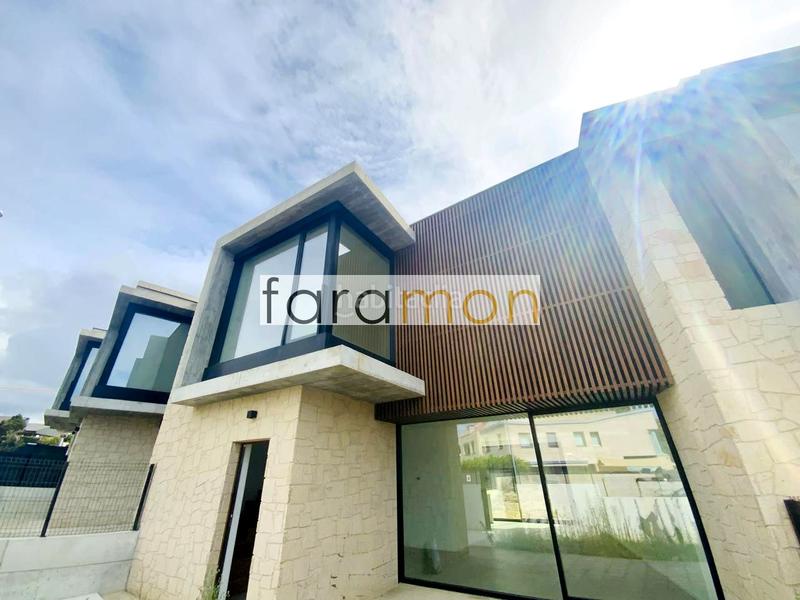 Foto 76a66ea2-c1a1-43f1-8b7c-5c2af8641bf4. Casa a schiera con riscaldamento parcheggio in San Pedro da Ramallosa Nigrán