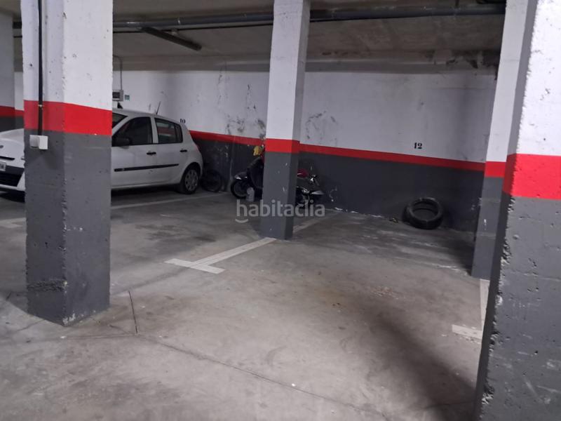 Foto 84312582-b82e-49f8-afed-dd18e6eba226. Autoparkplatz in Molar (El)