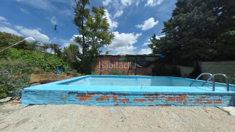 Foto bc5c92ec-8b70-4dae-a901-f77265680bb1. Chalet avec parking piscine dans Orusco de Tajuña
