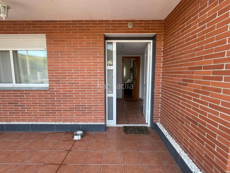 Foto f7a4f0b4-7e38-41a9-830c-4b22d79deb4f. Chalet avec cheminée chauffage parking dans Querol