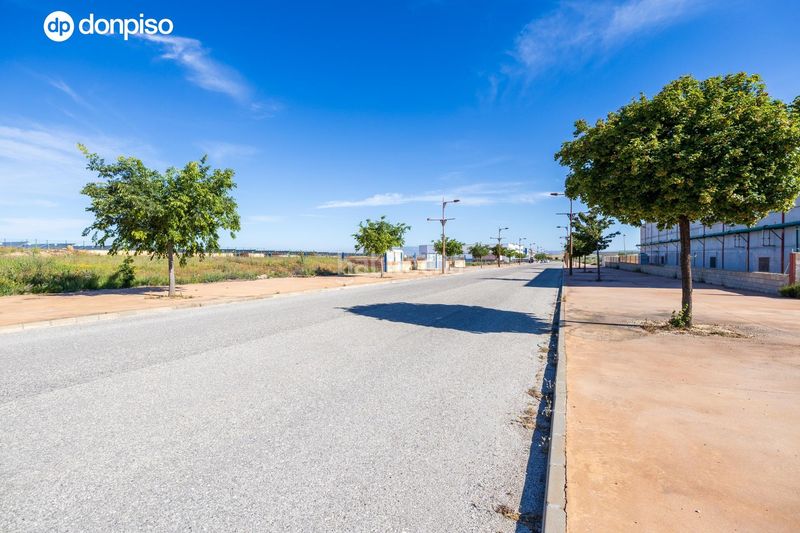 Foto f1e7223d-b509-4010-9f98-3ffeff7cff42. Area edificabile industriale in calle calle juncarillo in Escúzar