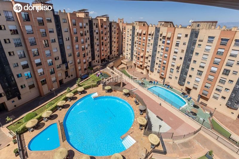 Foto 4a12c50f-e2ff-40e0-9979-9cf91f4c795a. Pis amb calefacció aparcament piscina a Cerrillo de Maracena - Periodistas Granada