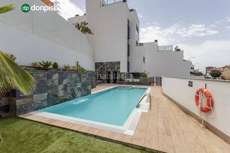Foto 0edc5cb9-2e4c-4183-8bde-d4b8366b21bb. Estudio  de reciente construcción con piscina, garaje y zonas comunes en Granada