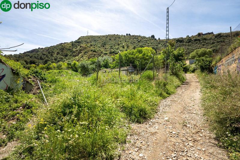 Foto 042d4d63-ebc2-4619-adbc-91897248d058. Rural plot in Cenes de la Vega