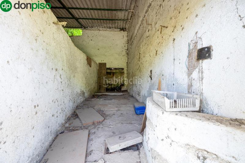 Foto 0e6d9c2a-8020-40e7-a051-478a7681209d. Rural plot in Cenes de la Vega