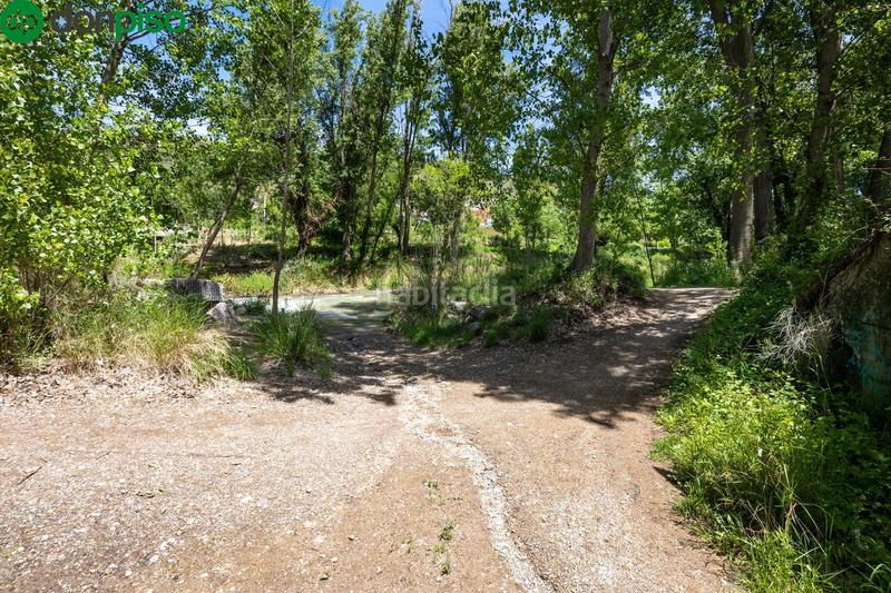 Foto 37bc8598-9c15-460c-a999-0c79101de66a. Rural plot in Cenes de la Vega