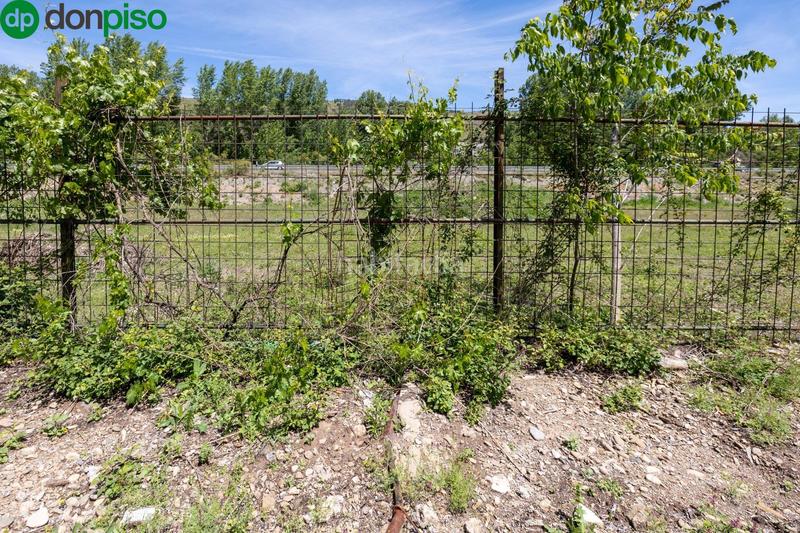 Foto 554448e6-5e70-44fe-b49d-f26ef5a776fc. Rural plot in Cenes de la Vega