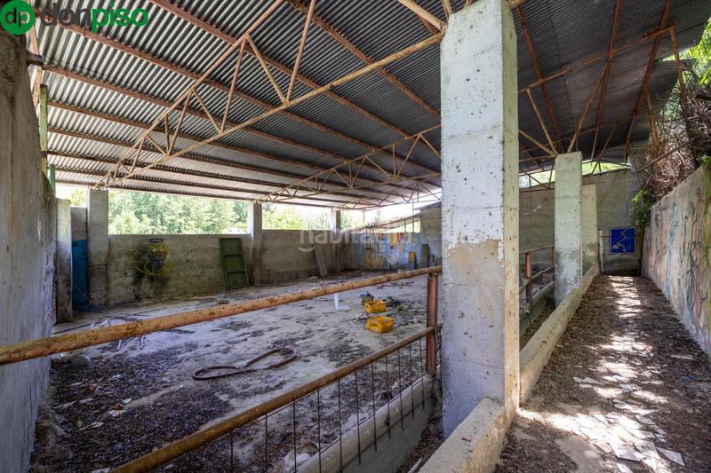 Foto 9dd11c40-68bc-4c1c-95c8-e8e62e9a4430. Rural plot in Cenes de la Vega