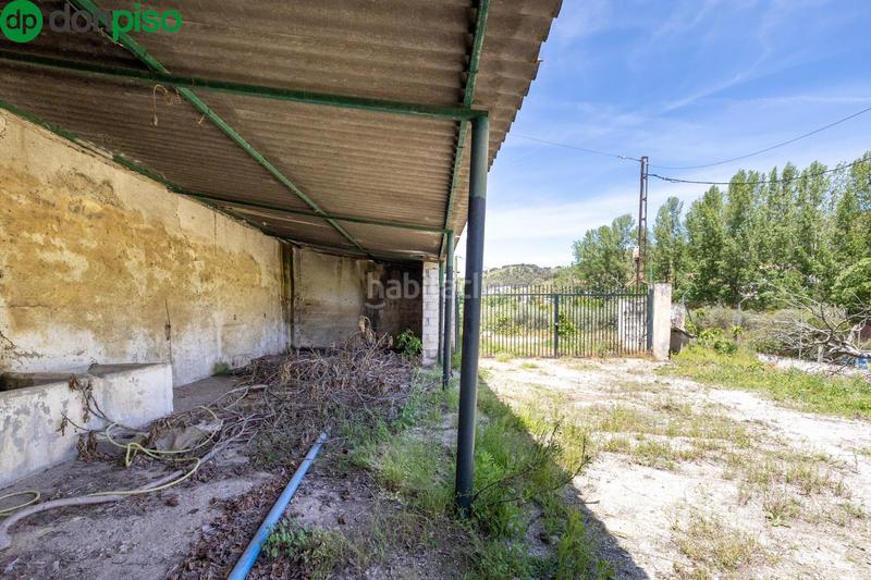 Foto b7e940cc-14e2-4e78-8039-be7b85a8259e. Rural plot in Cenes de la Vega