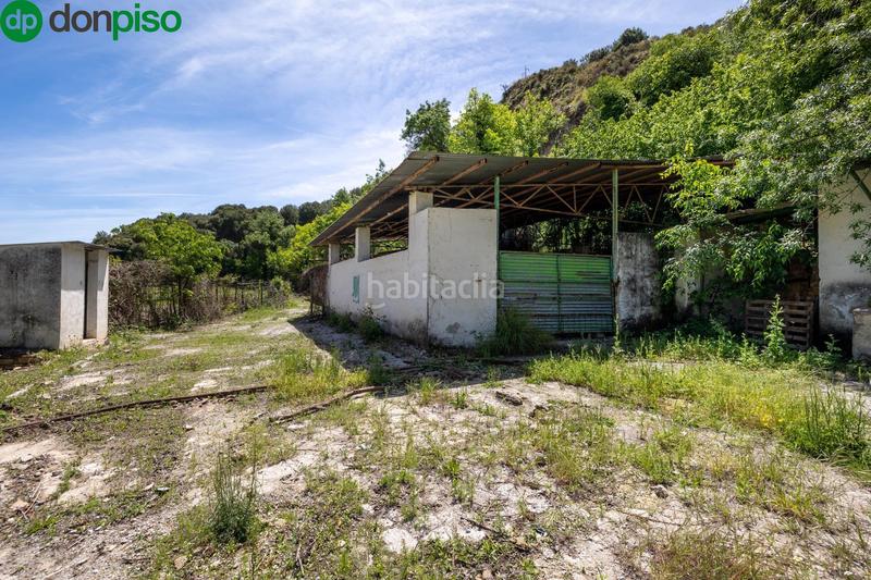 Foto be6f7278-c4b3-4c5b-86ed-e35bb1bec1e5. Rural plot in Cenes de la Vega