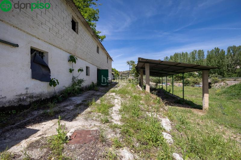 Foto c712c9a8-7781-4adb-b0ba-c3f75acbfb8f. Rural plot in Cenes de la Vega