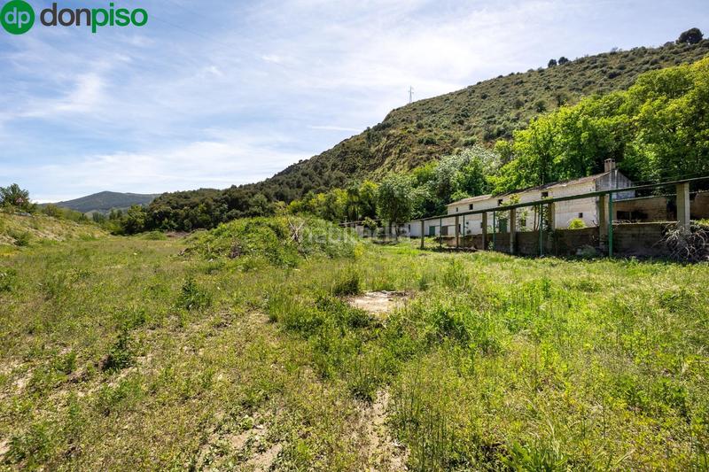 Foto e91e382c-5d88-4566-b676-3f5d3bc3174d. Rural plot in Cenes de la Vega