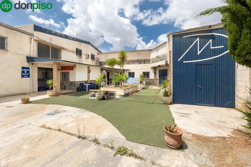 Foto 0edcab06-c686-485d-ad72-4144b8cf10fd. Fabrikhalle mit heizung in Atarfe