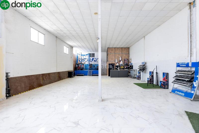 Foto c7903556-90ed-4c66-bc7c-d700af515cfc. Fabrikhalle mit heizung in Atarfe