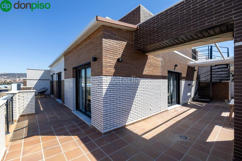 Foto af5dd457-c7ec-40c2-b55d-db48c4d8e524. Attico con parcheggio piscina in Campus de la Salud Armilla