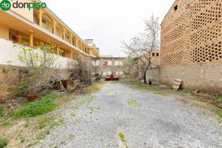 Terreny residencial  Calle gloria. Gran oportunidad en churriana de la vega  terreno con potencial!