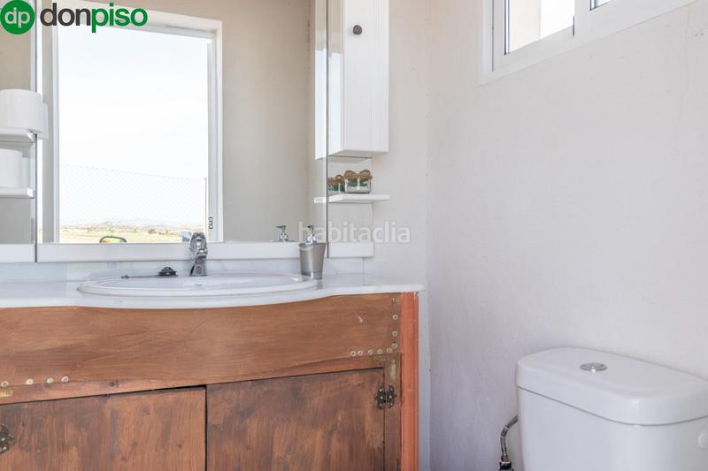 Foto 4cd3a2f5-f123-4f4a-a12f-ce209dd42612. Finca rústica  en venta con casa, nave y piscina en Padul