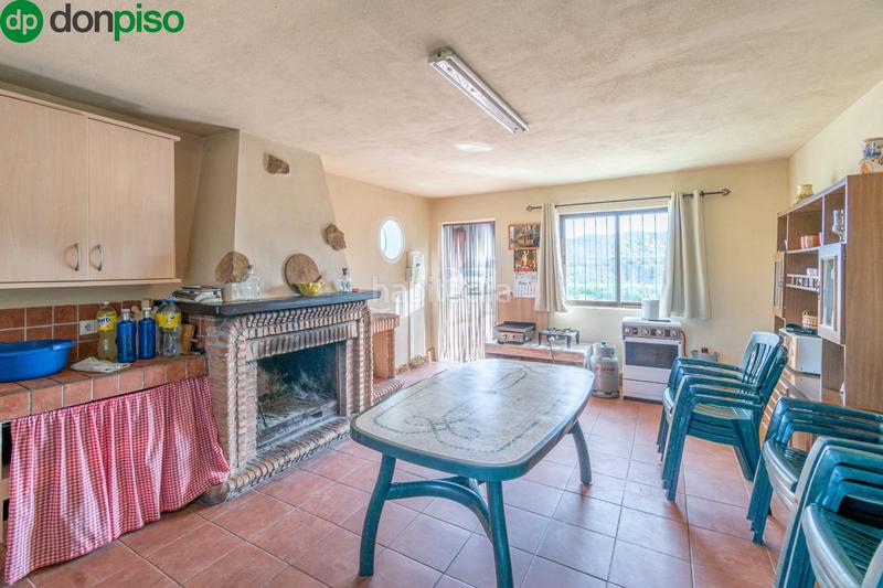 Foto 69d68e4e-67fd-4e9d-b6b8-108a4932230b. Finca rústica  en venta con casa, nave y piscina en Padul