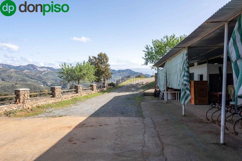 Foto c96ea7d8-cb3f-40eb-b58d-4c4fa86db751. Finca rústica a calle los chaparros 91 a Dúdar