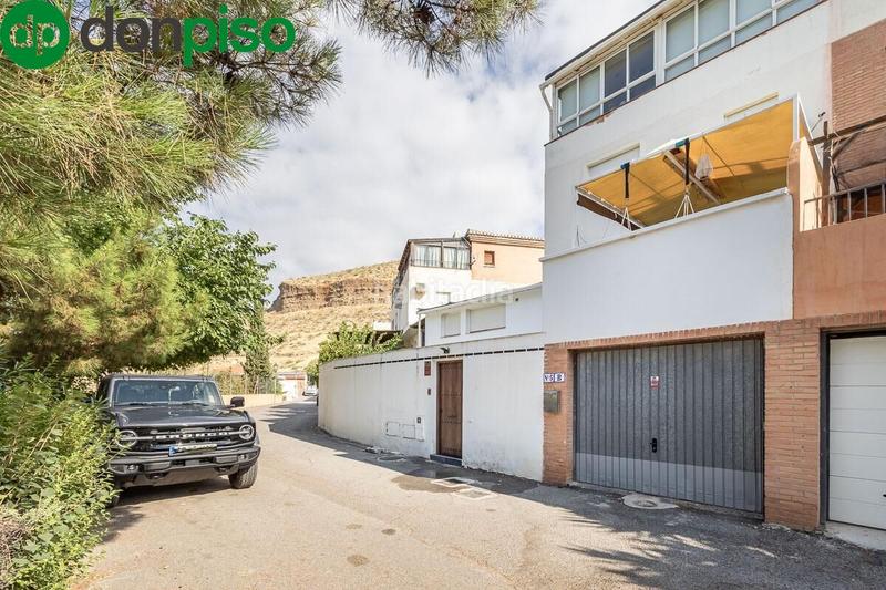 Foto 2ff0d475-a422-4ab3-ad4e-7e18b22cf753. Casa a schiera con piscina in Cenes de la Vega