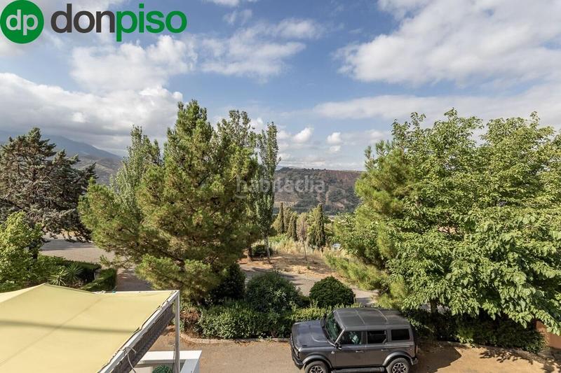 Foto 5ed3c560-dacf-48c7-965d-df1c05665f4e. Casa a schiera con piscina in Cenes de la Vega