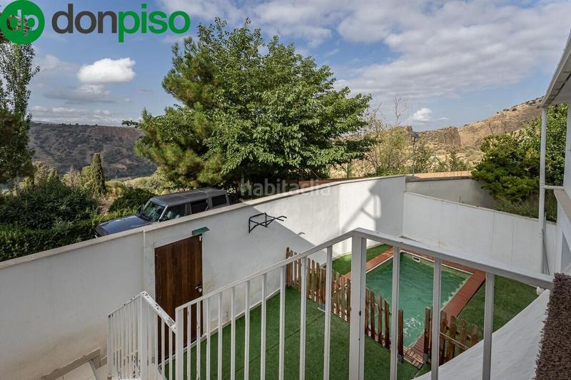 Foto 92892d25-51ce-4db9-b2c8-95d1a9195a32. Casa a schiera con piscina in Cenes de la Vega