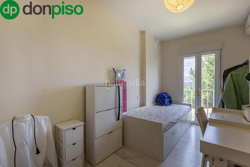 Foto c3d314f9-cb9c-4ac0-90a8-751f934f5bcc. Casa a schiera con piscina in Cenes de la Vega