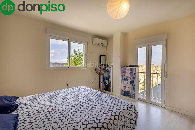 Foto e3f1a803-8de1-4041-bfc1-c15d2faabf29. Casa a schiera con piscina in Cenes de la Vega