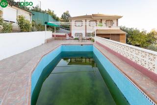 Chalet  Calle extrarradio. Chalet con piscina y dos apartamentos en cogollos vega granada