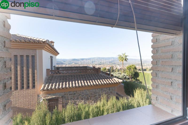 Foto 26a7d0a9-6d50-4c73-9b32-2930e3344a9e. Xalet amb calefacció aparcament piscina a Dúrcal