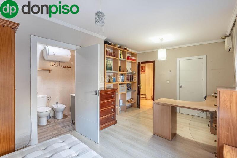 Foto 55e4ad6b-fca7-43bc-ac86-fe8802f6926e. Casa adossada amb calefacció a San Francisco Javier Granada