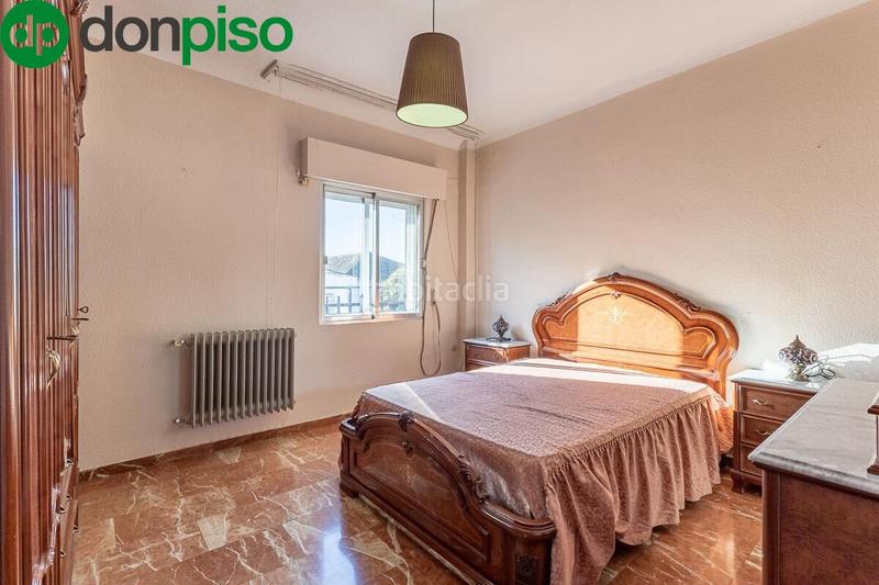 Foto d3aeb8ea-ee63-4f09-af3e-8d8498772693. Casa adossada amb calefacció a San Francisco Javier Granada