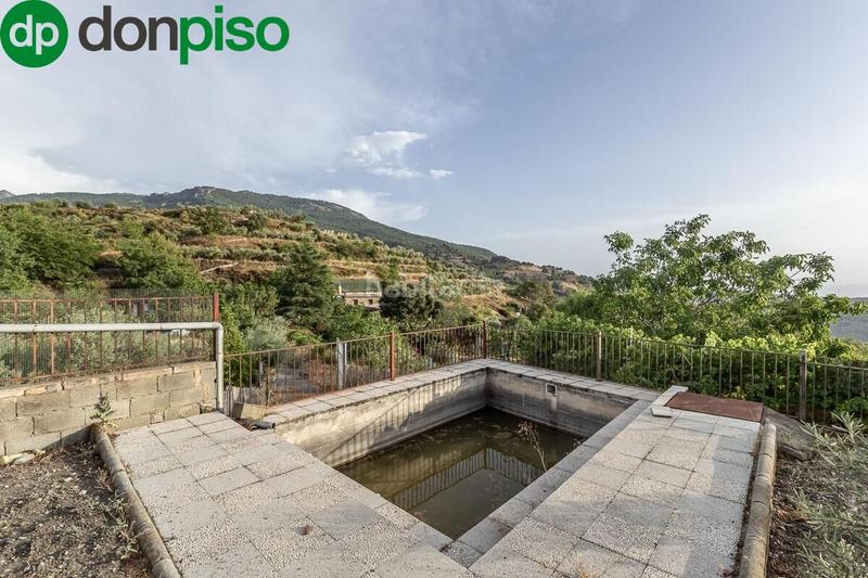 Foto 51e8cb6b-0860-4291-97c3-e814173e8944. Masía finca rústica en paraje los cahorros en Monachil pueblo Monachil