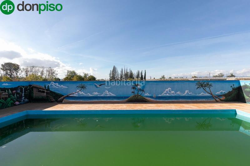 Foto c1a59abb-1643-46d8-a93f-cff0994c5db3. Casale con parcheggio in Rosaleda - Juventud Granada