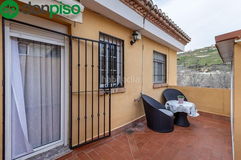Foto 773f4315-627f-4bee-8f4a-87f82270bf8e. Casa amb calefacció aparcament a Bola de Oro Granada