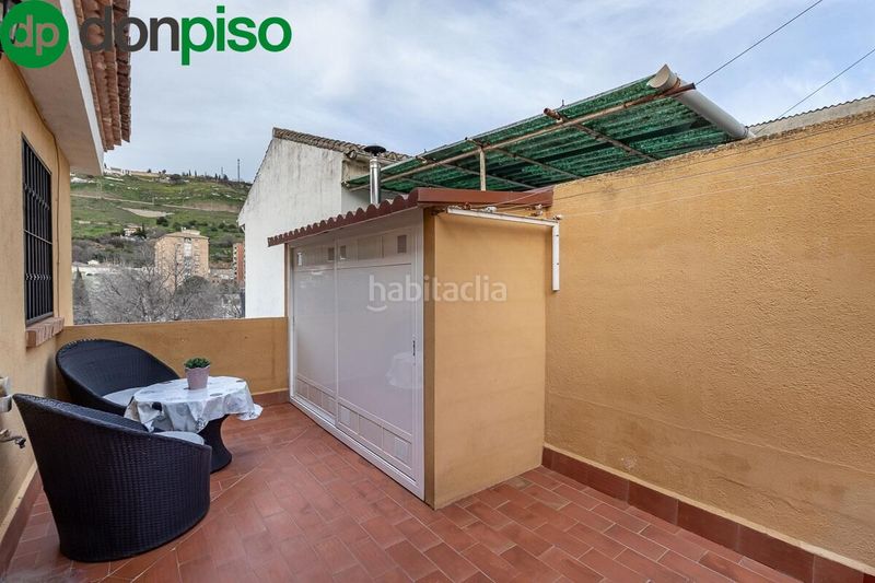Foto c8cb944a-f58a-42d1-9457-3f036571c7df. Casa amb calefacció aparcament a Bola de Oro Granada