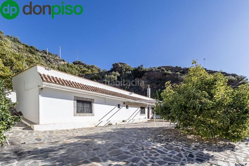 Foto 592e2420-13f6-4159-84ce-2202495a32e8. Casa encantadora casa de una planta con amplio terreno y piscina en guájar faragüit en Guájares (Los)