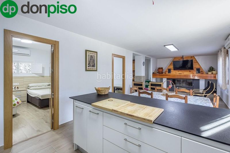 Foto 8ef8e3a4-8217-4e49-91e1-8de922c7f728. Casa encantadora casa de una planta con amplio terreno y piscina en guájar faragüit en Guájares (Los)