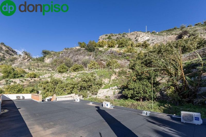 Foto c2152896-c2b8-406e-82c9-bcac27b54694. Casa encantadora casa de una planta con amplio terreno y piscina en guájar faragüit en Guájares (Los)
